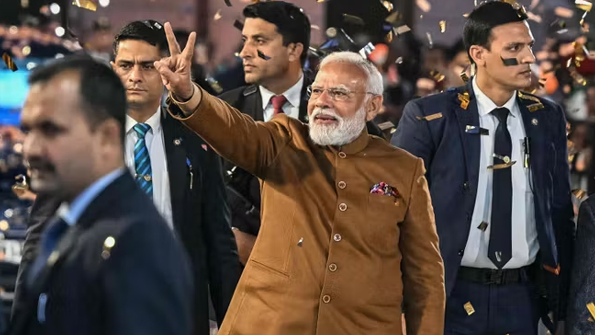 Three men using computers at an office in Ghana